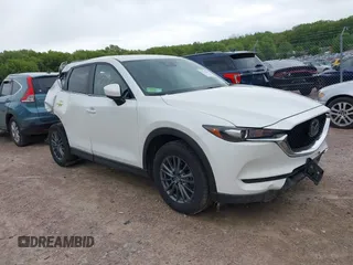 2020 Mazda CX-5 Touring z VIN JM3KFBCM5L1849029, wystawiony jako IAAI lot #42276356 z przebiegiem 169 527 mil mil oraz . Historia ofert i sprzedaży dostępna na DreamBid. Obrazek 1.