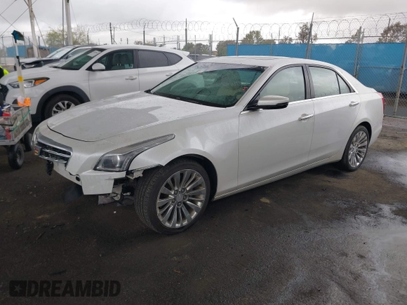2018 Cadillac CTS Sedan Luxury AWD with VIN 1G6AX5SX2J0127618, listed as a IAAI auction lot 41785890 with 79,994 mi miles. Bid and sale history available at carsss.com. Image 2.