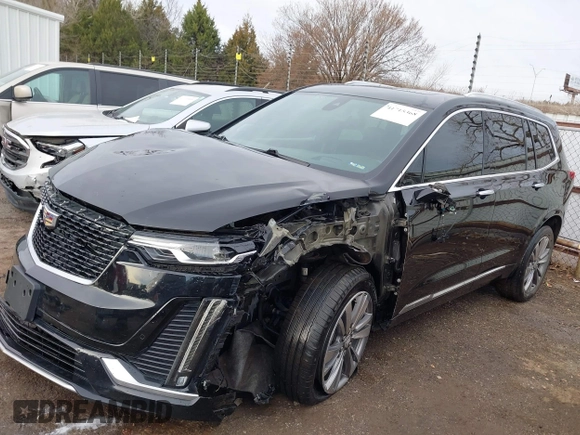 2021 Cadillac XT6 Premium Luxury z VIN 1GYKPDRS9MZ120150, wystawiony jako IAAI lot #41715368 z przebiegiem 47 835 mil mil oraz . Historia ofert i sprzedaży dostępna na DreamBid. Obrazek 15.