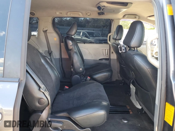 2013 Toyota Sienna SE with VIN 5TDXK3DC8DS310754, listed as a Copart auction lot 74880094 with 337,573 mi miles and Salvage title. Bid and sale history available at DreamBid. Image 11.
