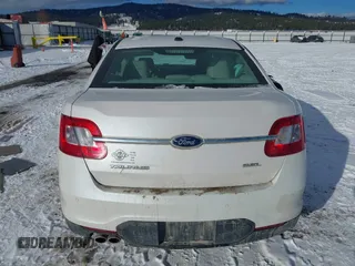2011 Ford Taurus SEL z VIN 1FAHP2EW2BG143071, wystawiony jako IAAI lot #41538097 z przebiegiem 126 668 mil mil oraz . Historia ofert i sprzedaży dostępna na DreamBid. Obrazek 16.