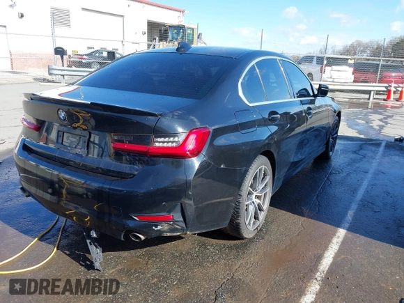 2020 BMW 3 Series 330i xDrive with VIN WBA5R7C06LFH40038, listed as a IAAI auction lot 41780401 with 100,588 mi miles. Bid and sale history available at carsss.com. Image 4.