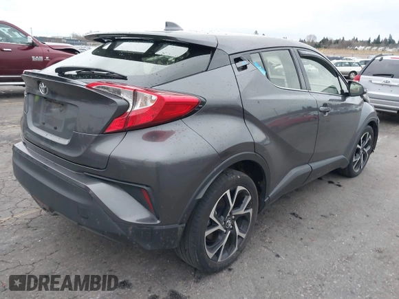 2019 Toyota C-HR XLE with VIN JTNKHMBX5K1035676, listed as a IAAI auction lot 41161562 with 185,962 mi miles. Bid and sale history available at carsss.com. Image 4.
