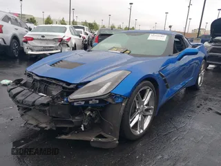 2016 Chevrolet Corvette Z51 3LT z VIN 1G1YM2D74G5116883, wystawiony jako IAAI lot #42160585 z przebiegiem 25 939 mil mil oraz . Historia ofert i sprzedaży dostępna na DreamBid. Obrazek 2.