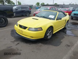 2001 Ford Mustang Deluxe с VIN 1FAFP44451F131472, выставлен на аукционе IAAI как лот 42119006 с пробегом 63 388 миль миль и . История ставок и продаж доступна на DreamBid. Изображение 18.