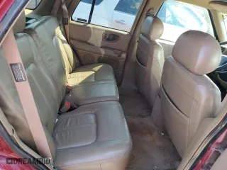 1998 Oldsmobile Bravada with VIN 1GHDT13W8W2702234, listed as a Copart auction lot 61893974 with 164,761 mi miles and Salvage Title. Bid and sale history available at carsss.com. Image 10.