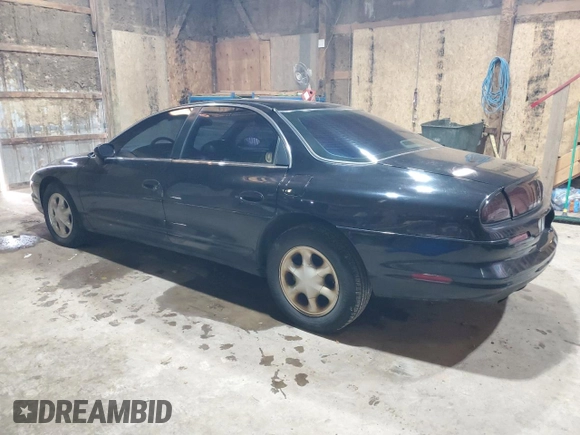 1999 Oldsmobile Aurora with VIN 1G3GR62C1X4109326, listed as a Copart auction lot 49550935 with 208,500 mi miles and Clean Title. Bid and sale history available at DreamBid. Image 2.