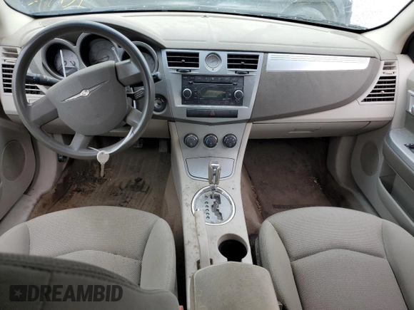 2007 Chrysler Sebring Touring z VIN 1C3LC56K57N527947, wystawiony jako Copart lot #52789485 z przebiegiem Nie podano mil oraz Szkody całkowita. Historia ofert i sprzedaży dostępna na DreamBid. Obrazek 8.