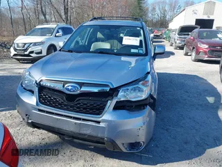 2015 Subaru Forester 2.5i Limited with VIN JF2SJAHC1FH814910, listed as a IAAI auction lot 42067236 with 228,306 mi miles. Bid and sale history available at carsss.com. Image 12.