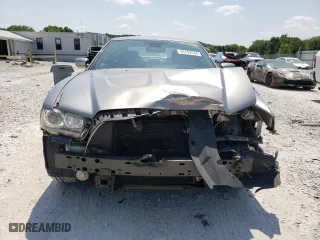 2011 Dodge Charger RT Max with VIN 2B3CM5CT7BH572445, listed as a Copart auction lot 66782634 with 129,743 mi miles and Salvage Title. Bid and sale history available at carsss.com. Image 5.