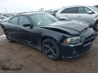 2013 Dodge Charger SXT Plus with VIN 2C3CDXHG1DH620101, listed as a IAAI auction lot 41755409 with 186,939 mi miles. Bid and sale history available at carsss.com. Image 1.