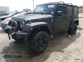 2013 Jeep Wrangler Unlimited Rubicon 10th Anniversary with VIN 1C4HJWFGXDL543660, listed as a Copart auction lot 61462104 with 115,897 mi miles and Salvage title. Bid and sale history available at DreamBid. Image 1.
