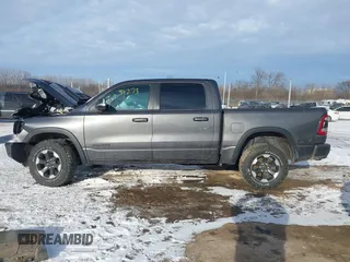 2022 Ram 1500 Rebel z VIN 1C6SRFLT9NN204868, wystawiony jako IAAI lot #41351273 z przebiegiem 67 120 mil mil oraz . Historia ofert i sprzedaży dostępna na DreamBid. Obrazek 14.