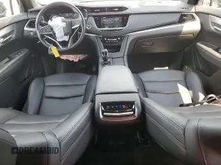 2023 Cadillac XT6 FWD Luxury z VIN 1GYKPAR45PZ187400, wystawiony jako Copart lot #54562335 z przebiegiem 16 953 mil mil oraz Szkoda całkowita • Salvage title. Historia ofert i sprzedaży dostępna na DreamBid. Obrazek 8.