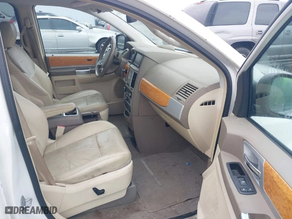 2010 Chrysler Town & Country Limited with VIN 2A4RR6DX1AR141930, listed as a IAAI auction lot 41557272 with NaN miles. Bid and sale history available at carsss.com. Image 5.