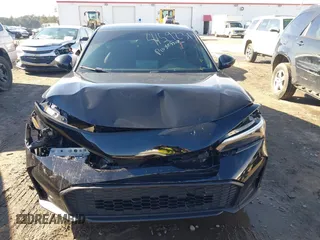 2025 Honda Civic Sport with VIN 2HGFE2F51SH525286, listed as a IAAI auction lot 41592317 with 3,554 mi miles and . Bid and sale history available at DreamBid. Image 12.
