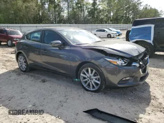 2017 Mazda 3 Touring with VIN 3MZBN1L77HM117864, listed as a Copart auction lot 51895385 with 63,076 mi miles and Salvage Title. Bid and sale history available at carsss.com. Image 4.