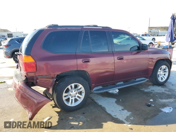 2003 GMC Envoy SLT with VIN 1GKDT13S732378731, listed as a Copart auction lot 88340825 with 125,814 mi miles and Salvage Title. Bid and sale history available at carsss.com. Image 3.