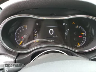 2018 Jeep Grand Cherokee Trailhawk with VIN 1C4RJFLG8JC164774, listed as a Copart auction lot 51699845 with 104,467 mi miles and Salvage title. Bid and sale history available at DreamBid. Image 9.