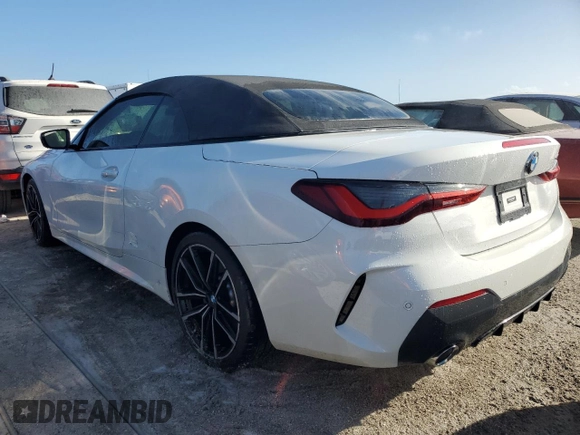 2022 BMW 4 Series 430i with VIN WBA23AT02NCJ38076, listed as a Copart auction lot 76186884 with 21,106 mi miles and Non repairable. Bid and sale history available at DreamBid. Image 2.