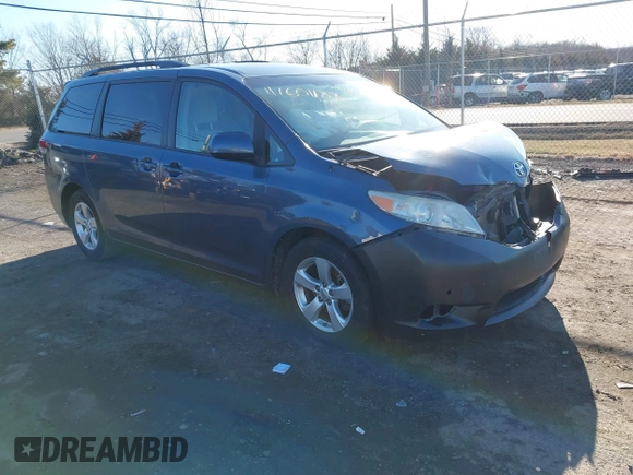 2014 Toyota Sienna LE AAS with VIN 5TDKK3DC4ES514981, listed as a IAAI auction lot 41601188 with 164,963 mi miles and . Bid and sale history available at DreamBid. Image 1.