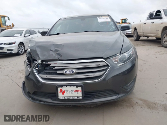 2015 Ford Taurus SEL with VIN 1FAHP2E8XFG161616, listed as a IAAI auction lot 42049199 with 138,565 mi miles and . Bid and sale history available at carsss.com. Image 12.