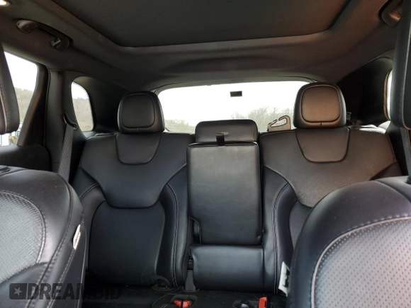 2021 Jeep Cherokee 80th Anniversary with VIN 1C4PJMMX4MD135393, listed as a Copart auction lot 52033255 with 76,546 mi miles and Salvage Title. Bid and sale history available at carsss.com. Image 10.