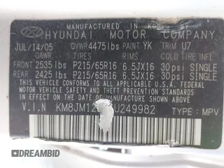 2006 Hyundai Tucson GL with VIN KM8JM12BX6U249982, listed as a IAAI auction lot 41976033 with 107,153 mi miles. Bid and sale history available at carsss.com. Image 9.