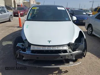 2024 Tesla Model Y with VIN 7SAYGDEDXRA300743, listed as a IAAI auction lot 41690374 with 12,446 mi miles and . Bid and sale history available at DreamBid. Image 13.