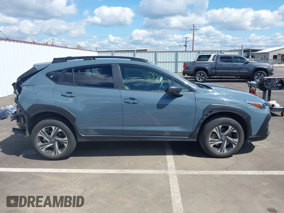 2024 Subaru Crosstrek Premium with VIN JF2GUADC6R8306021, listed as a IAAI auction lot 42078539 with 28,497 mi miles and . Bid and sale history available at DreamBid. Image 14.