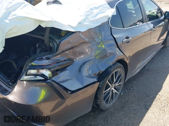 2023 Toyota Camry SE z VIN 4T1T11AK8PU802097, wystawiony jako IAAI lot #42389754 z przebiegiem 19 732 mil mil oraz . Historia ofert i sprzedaży dostępna na DreamBid. Obrazek 17.