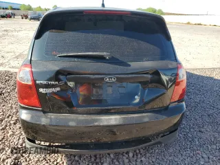2006 Kia Spectra with VIN KNAFE162065241706, listed as a Copart auction lot 68949914 with 153,169 mi miles and Salvage Title. Bid and sale history available at carsss.com. Image 6.