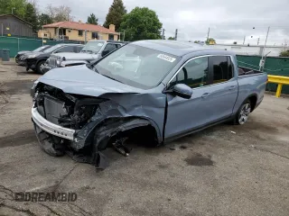 2025 Honda Ridgeline RTL with VIN 5FPYK3F52SB029951, listed as a Copart auction lot 60664925 with 1,205 mi miles and Salvage title. Bid and sale history available at DreamBid. Image 1.