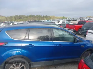 2019 Ford Escape SE z VIN 1FMCU9GD5KUA06575, wystawiony jako IAAI lot #41942726 z przebiegiem 85 290 mil mil oraz . Historia ofert i sprzedaży dostępna na DreamBid. Obrazek 13.