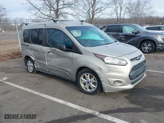2015 Ford Transit Connect Wagon XLT with VIN NM0AE8F74F1179538, listed as a IAAI auction lot 41505221 with 57,798 mi miles. Bid and sale history available at carsss.com. Image 1.