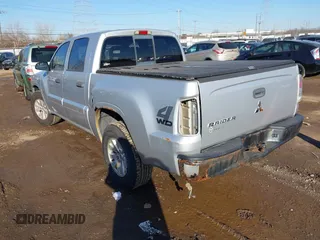2006 Mitsubishi Raider LS with VIN 1Z7HT28K86S580062, listed as a IAAI auction lot 41766477 with 255,704 mi miles. Bid and sale history available at carsss.com. Image 3.
