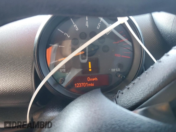 2015 MINI Countryman with VIN WMWZB3C50FWR45253, listed as a Copart auction lot 63608655 with 123,701 mi miles and Salvage title. Bid and sale history available at DreamBid. Image 9.