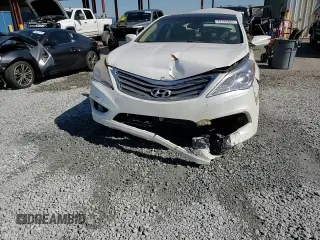 2014 Hyundai Azera Limited z VIN KMHFH4JG1EA361448, wystawiony jako Copart lot #42344065 z przebiegiem 178 452 mil mil oraz Szkoda całkowita • Salvage title. Historia ofert i sprzedaży dostępna na DreamBid. Obrazek 13.