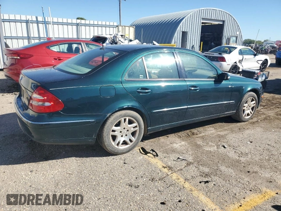 2003 Mercedes-Benz E-Class 3.2L with VIN WDBUF65J53A101021, listed as a Copart auction lot 73015774 with 242,812 mi miles and Clean Title. Bid and sale history available at carsss.com. Image 3.