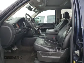 2007 GMC Yukon SLT with VIN 1GKFK13097J384794, listed as a Copart auction lot 72596384 with 198,381 mi miles and Salvage Title. Bid and sale history available at carsss.com. Image 7.