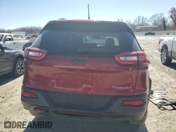 2015 Jeep Cherokee Trailhawk z VIN 1C4PJMBBXFW615145, wystawiony jako Copart lot #47294225 z przebiegiem 99 662 mil mil oraz Szkoda całkowita • Salvage title. Historia ofert i sprzedaży dostępna na DreamBid. Obrazek 6.