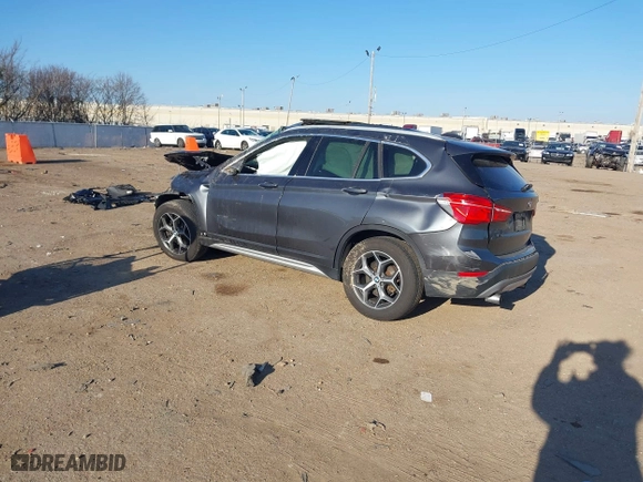 2018 BMW X1 xDrive28i with VIN WBXHT3C37J5K23855, listed as a IAAI auction lot 41442191 with 1 mi miles. Bid and sale history available at carsss.com. Image 3.