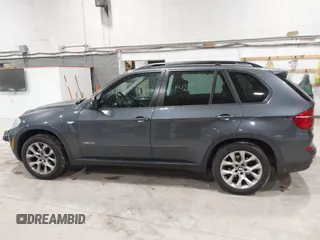 2012 BMW X5 35i z VIN 5UXZV4C59CL985715, wystawiony jako IAAI lot #42307586 z przebiegiem 105 147 mil mil oraz . Historia ofert i sprzedaży dostępna na DreamBid. Obrazek 14.