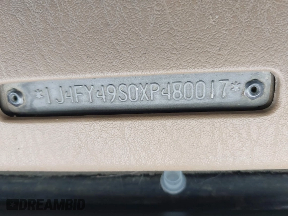 1999 Jeep Wrangler Sahara with VIN 1J4FY49S0XP480017, listed as a IAAI auction lot 41642577 with 154,068 mi miles. Bid and sale history available at carsss.com. Image 9.