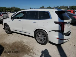 2024 Cadillac XT6 FWD Premium Luxury with VIN 1GYKPCRS4RZ742995, listed as a Copart auction lot 82802774 with 5,898 mi miles and Salvage Title. Bid and sale history available at carsss.com. Image 2.