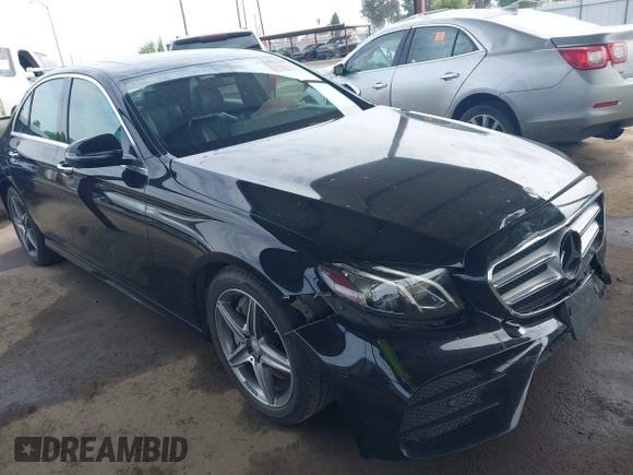 2017 Mercedes-Benz E 300 Luxury z VIN WDDZF4JBXHA036044, wystawiony jako IAAI lot #42053988 z przebiegiem 105 067 mil mil oraz . Historia ofert i sprzedaży dostępna na DreamBid. Obrazek 1.