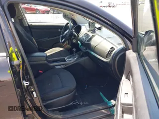 2013 Kia Sportage LX with VIN KNDPBCA25D7449584, listed as a IAAI auction lot 42489414 with 100,993 mi miles and . Bid and sale history available at DreamBid. Image 5.