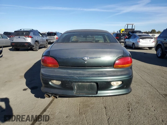 2001 Chrysler LHS z VIN 2C3AC56G31H606648, wystawiony jako Copart lot #77123814 z przebiegiem 83 574 mil mil oraz Tytuł czysty. Historia ofert i sprzedaży dostępna na DreamBid. Obrazek 6.