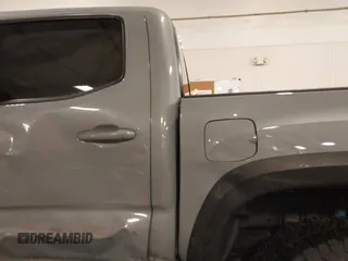 2019 Toyota Tacoma SR z VIN 3TMCZ5AN1KM232360, wystawiony jako IAAI lot #42006355 z przebiegiem 133 909 mil mil oraz . Historia ofert i sprzedaży dostępna na DreamBid. Obrazek 12.
