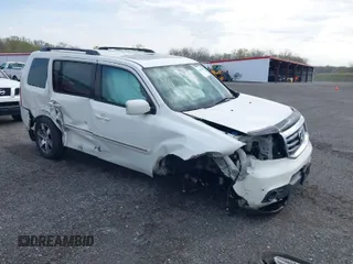 2014 Honda Pilot Touring with VIN 5FNYF4H97EB046879, listed as a IAAI auction lot 42017280 with 167,564 mi miles and . Bid and sale history available at carsss.com. Image 1.
